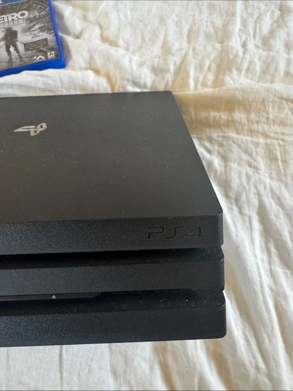 Sony PlayStation 4 Slim Bundle with Red and Black Controllers